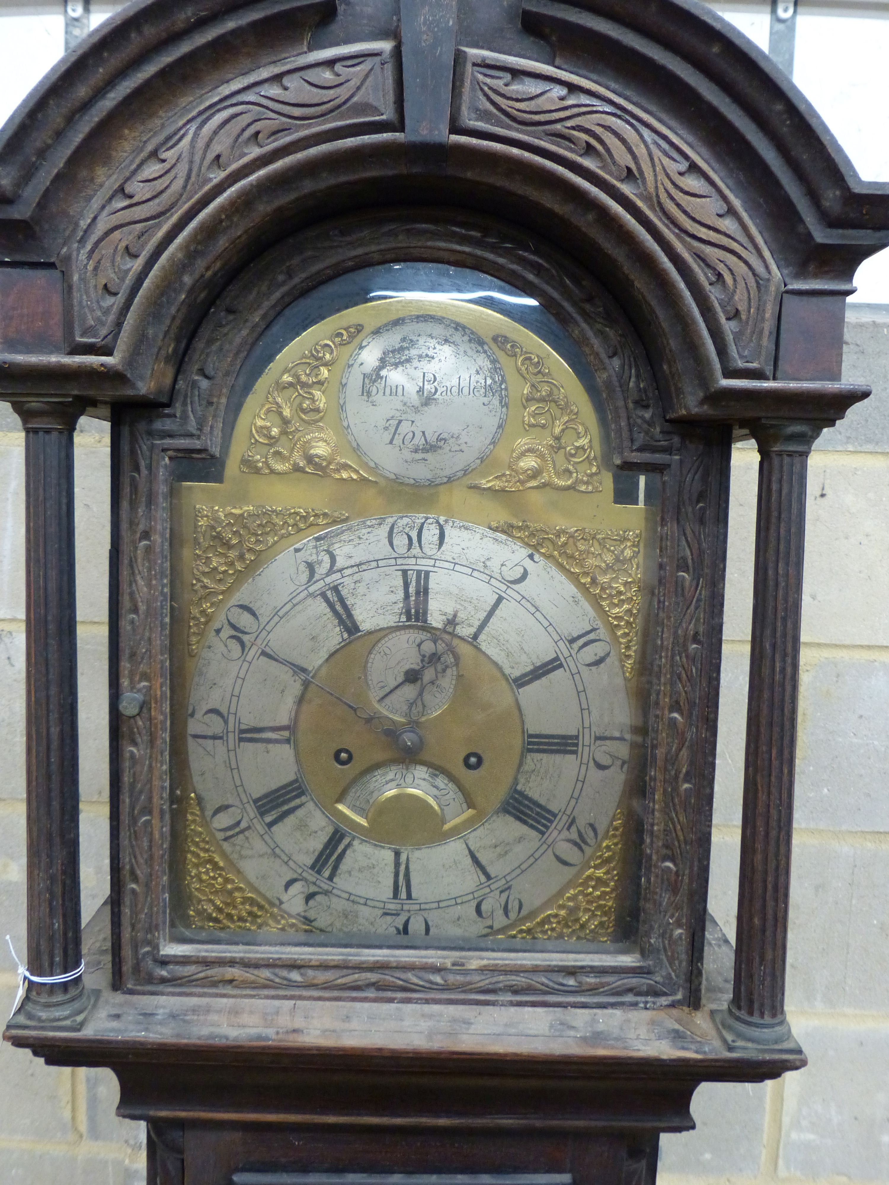 John Badely of Tong. A George III carved oak eight day longcase clock, height 228cm